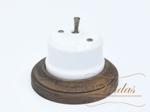 Выключатель керамика тумблерный 1 кл. перекрестный, белый с бронзовой ручкой Lindas 34610-B