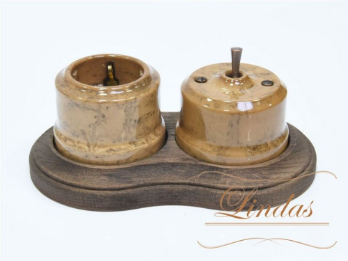 Выключатель керамика тумблерный 1 кл. проходной, капучино с медной ручкой Lindas 34530-C