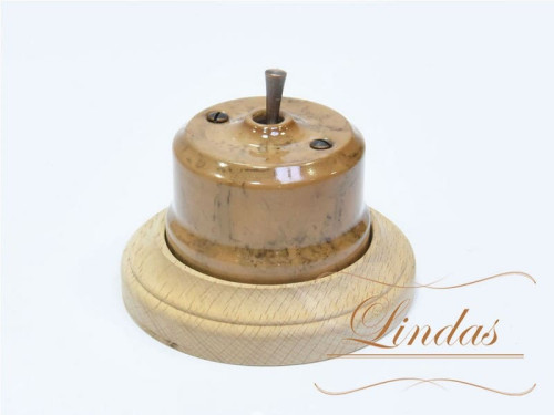 Выключатель керамика тумблерный 1 кл. перекрестный, капучино с медной ручкой Lindas 34630-C