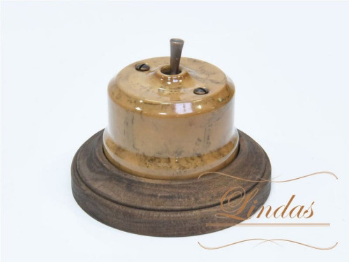 Выключатель керамика тумблерный 1 кл. перекрестный, капучино с медной ручкой Lindas 34630-C