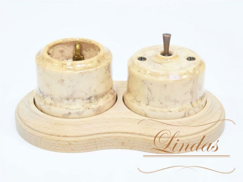 Выключатель керамика тумблерный 1 кл., карамель с медной ручкой Lindas 34431-C