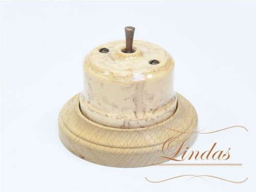 Выключатель керамика тумблерный 1 кл. проходной, карамель с медной ручкой Lindas 34531-C
