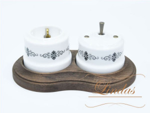 Выключатель керамика тумблерный 1 кл. перекрестный, Белый/Черный орн. с бронзовой ручкой, Lindas 34620-B